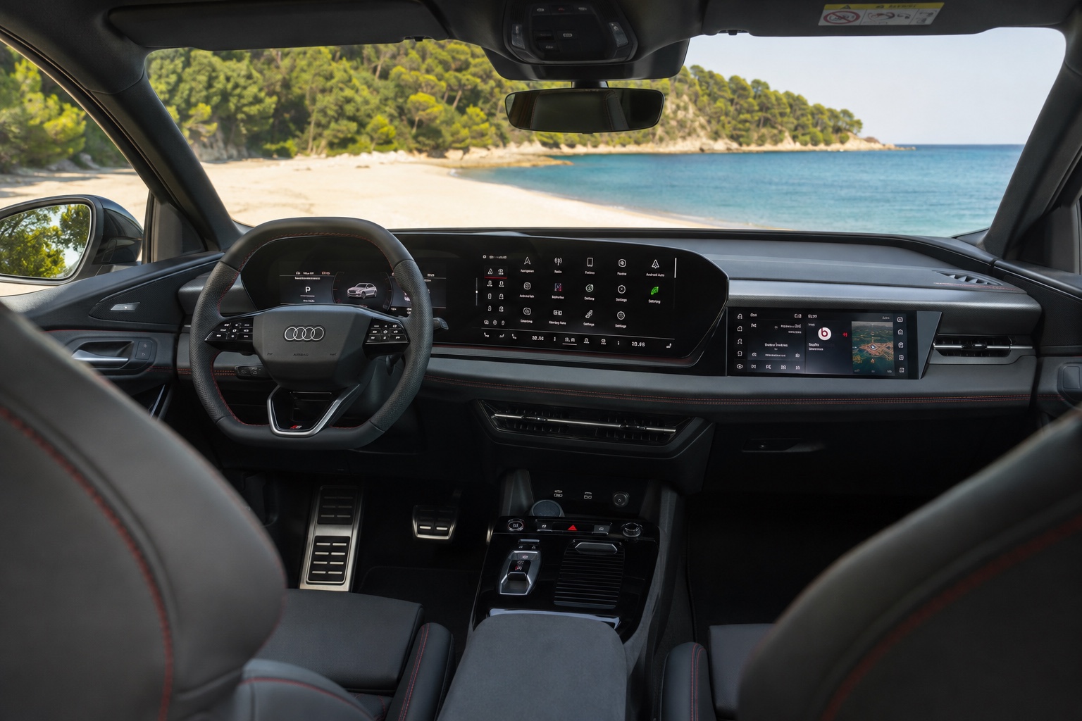 Audi SQ6 e-tron-kabine set skråt fra højre bagsæde med de fabriksmonterede skærme tændt